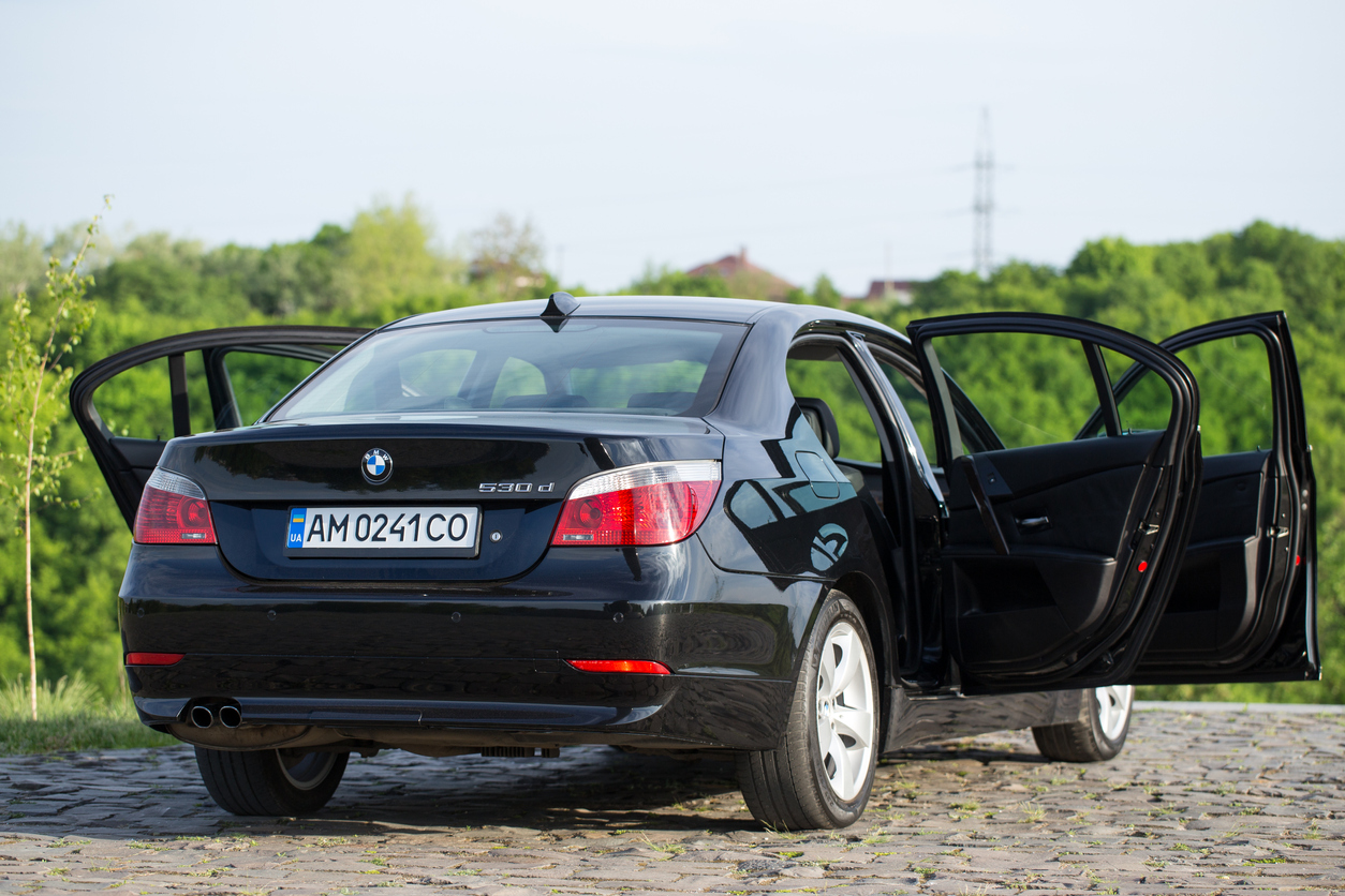 BMW With Open Doors - Euro Car Parts Blog